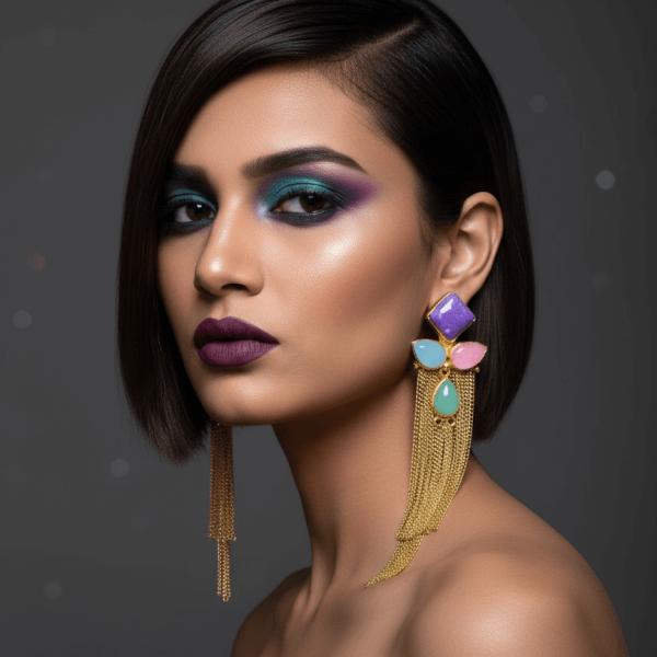 Belsi's Jewelry handcrafted gold tassel earrings with a violet square top, blush pink and sky blue teardrop stones, and mint green center on a white background.