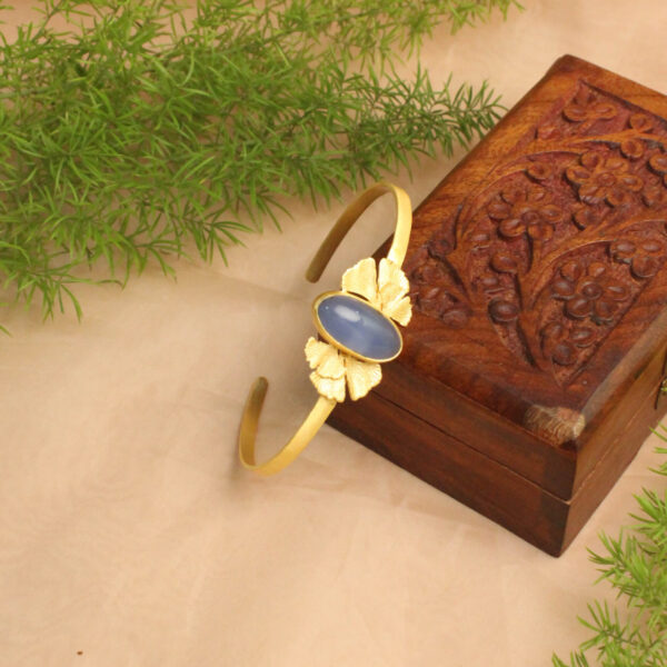 Gold polish bracelet studded with sparkling stones
