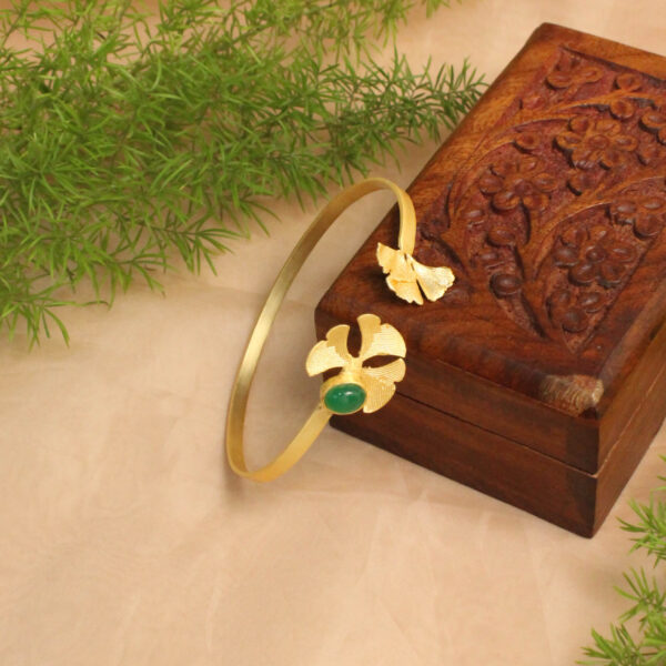 Gold polish bracelet studded with sparkling stones