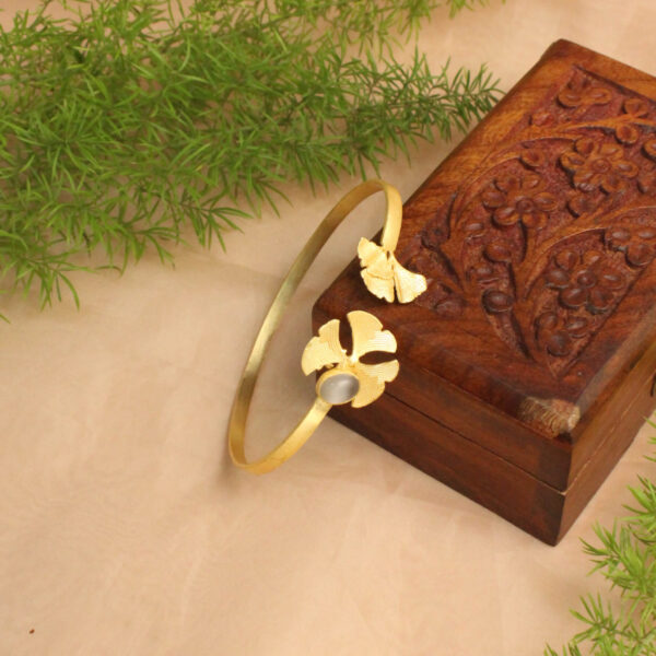 Gold polish bracelet studded with sparkling stones