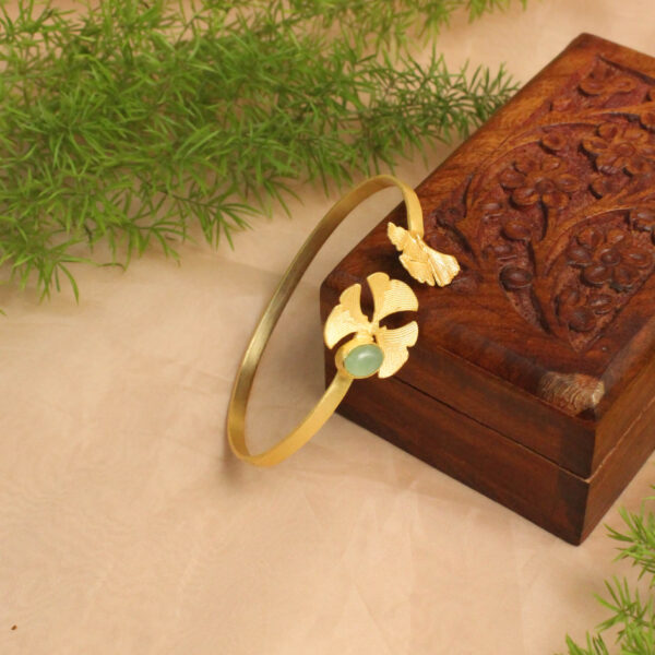 Gold polish bracelet studded with sparkling stones