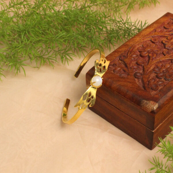 Gold polish bracelet studded with sparkling stones