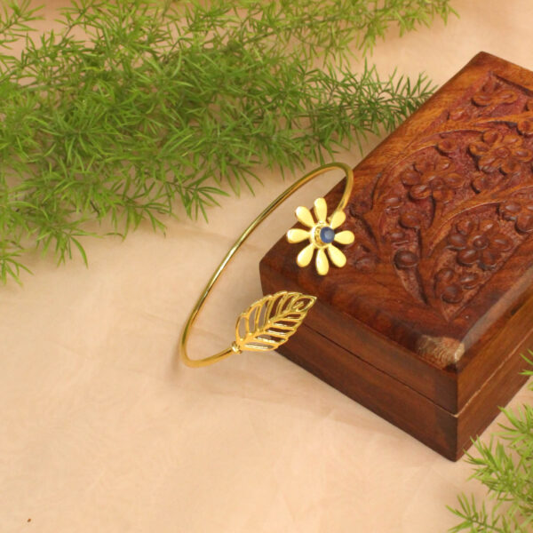 Gold polish bracelet studded with sparkling stones