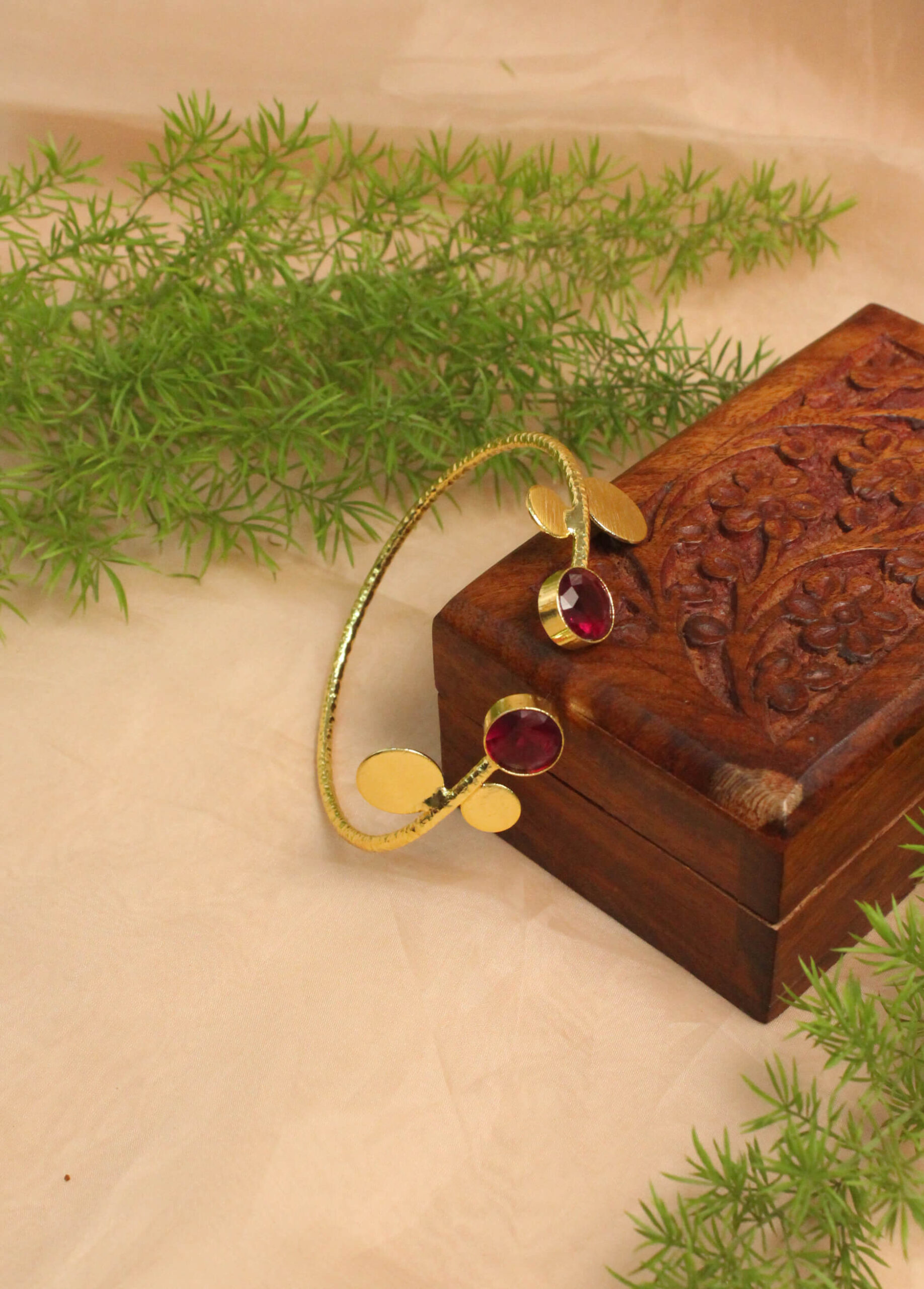 Gold Polish Bracelet with Sparkling Stones 1 Gold polish bracelet studded with sparkling stones