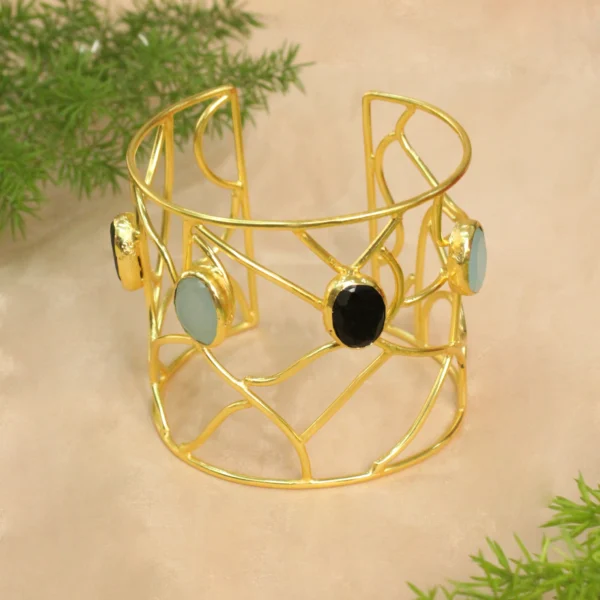 Gold polish handcuff studded with sparkling stones