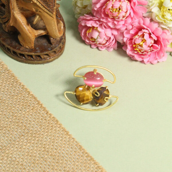 A handcrafted natural stone ring with a gemstone set in a minimalist band