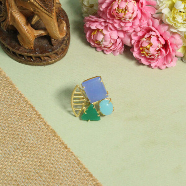 A handcrafted natural stone ring with a gemstone set in a minimalist band