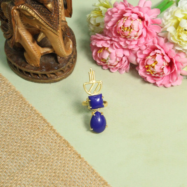 A handcrafted natural stone ring with a gemstone set in a minimalist band