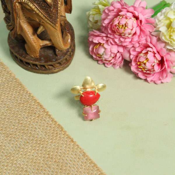 A handcrafted natural stone ring with a gemstone set in a minimalist band