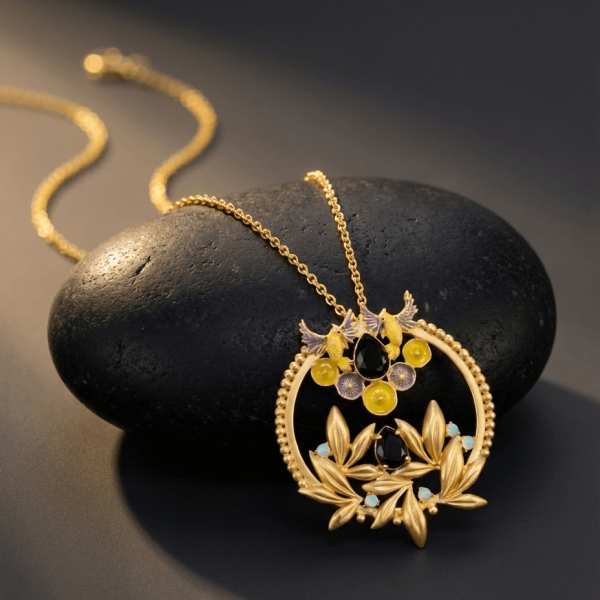 Handcrafted Round Enamel Necklace with Bird and Floral Motif – Artisan Nature Jewelry