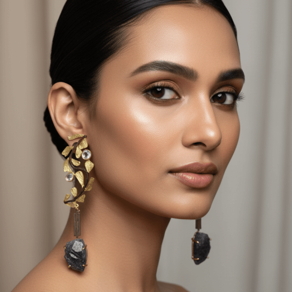 "Gold vine statement earrings with raw black stone drops handcrafted designer jewelry India"