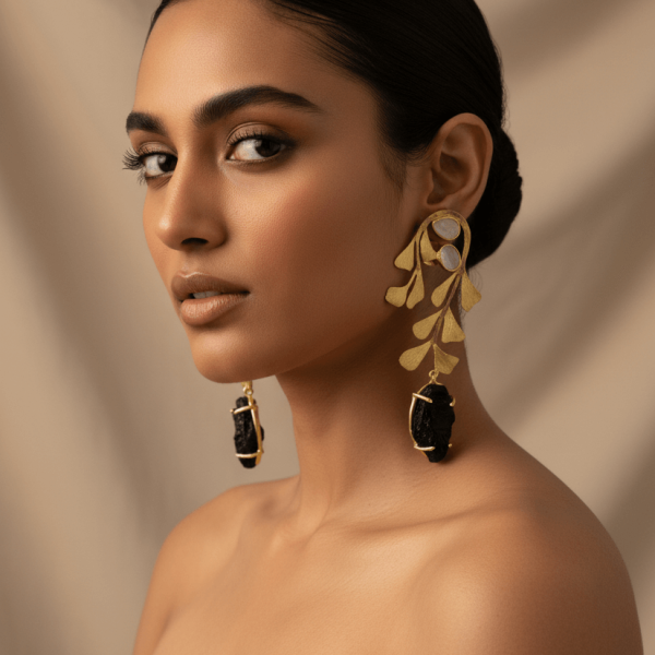 "Gold leaf cluster earrings with polki and raw black stone drops handcrafted designer jewelry"