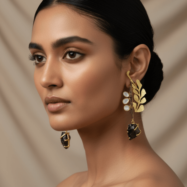 "Gold leaf earrings with polki uncut diamonds and raw black stone drops handcrafted designer jewelry"