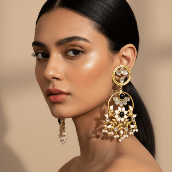 "Black stone enamel floral kundan drop earrings with pearl detailing and gold finish"