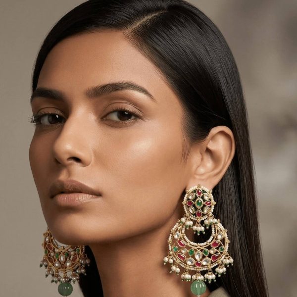 model-wearing-traditional-navratan-kundan-chandbali-earrings-with-ruby-emerald-stones-and-pearl-border-Belsis