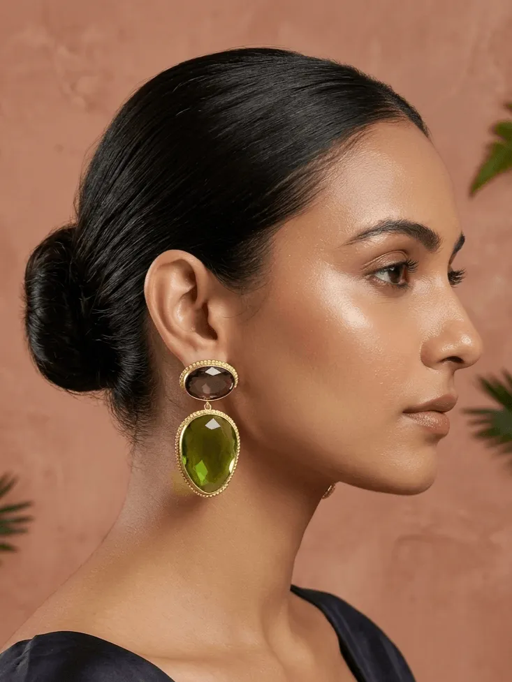 Amethyst Purple and Olive Green Two-Tier Drop Earrings 1 Belsi's Jewelry two-tier statement drop earrings featuring an oval amethyst purple quartz top stone and a large, faceted olive green teardrop crystal encased in handcrafted gold-plated borders.