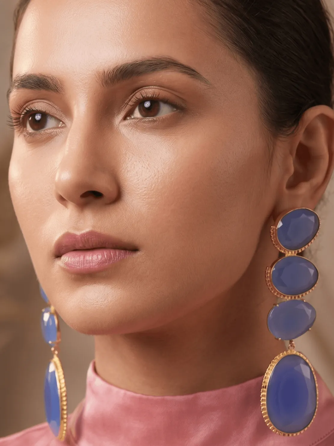 Periwinkle Blue Quartz Multi-Tier Drop Earrings 1 Belsi's Jewelry multi-tier statement drop earrings featuring four graduated, faceted periwinkle lavender blue quartz stones encased in handcrafted gold-plated frames.